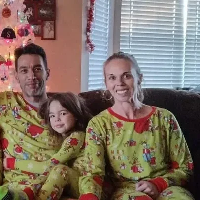 family of a mother, father, and daughter